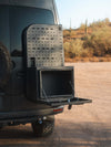 Medium Expedition Cargo Box mounted on vehicle with open storage compartment and rugged desert background
