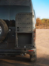 Medium Expedition Cargo Box mounted on rear of off-road vehicle with open storage compartment and rugged design