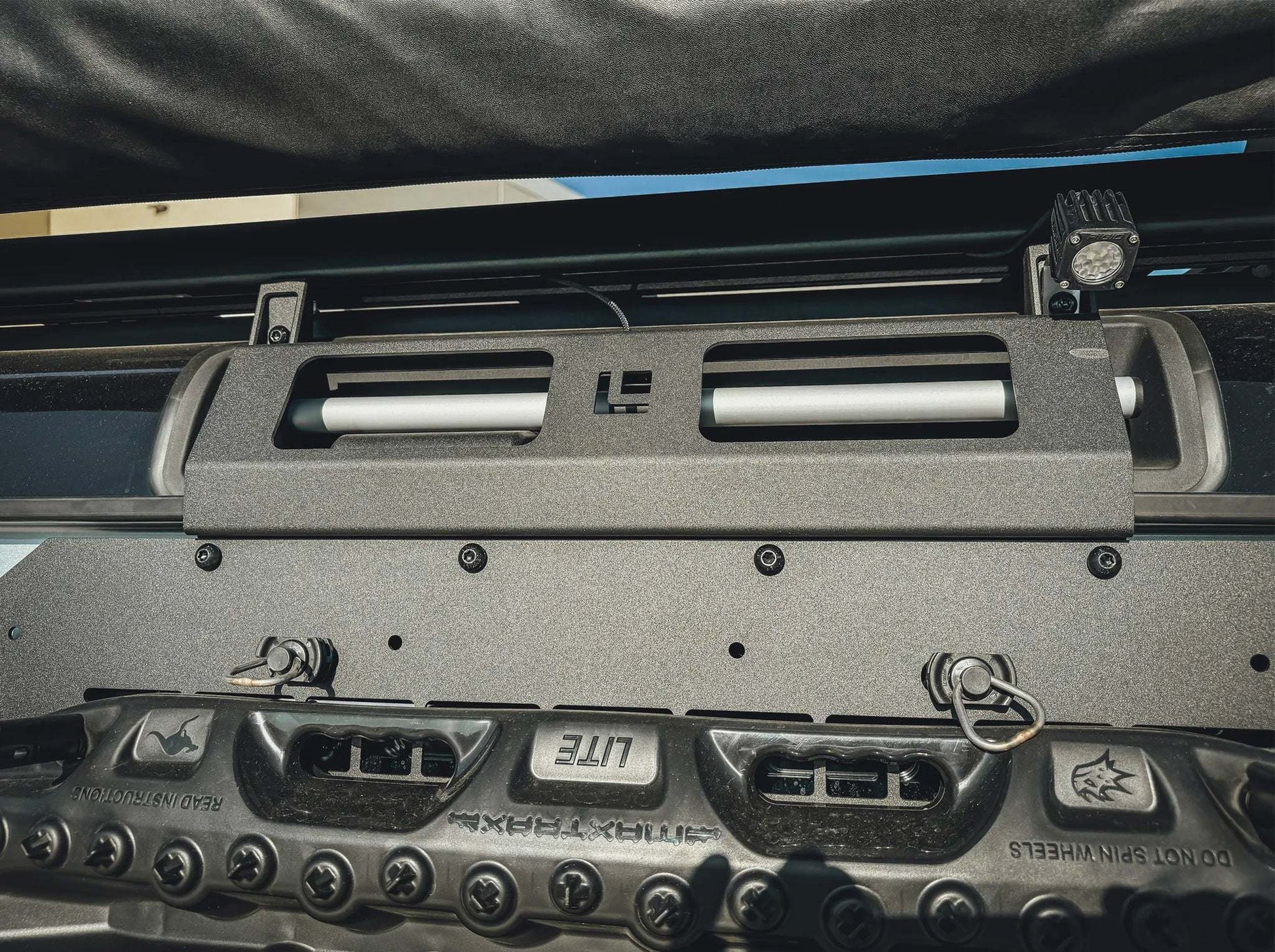 Durable Grenadier accessory panel by Leitner Designs mounted on vehicle for off-road utility and aesthetic upgrades