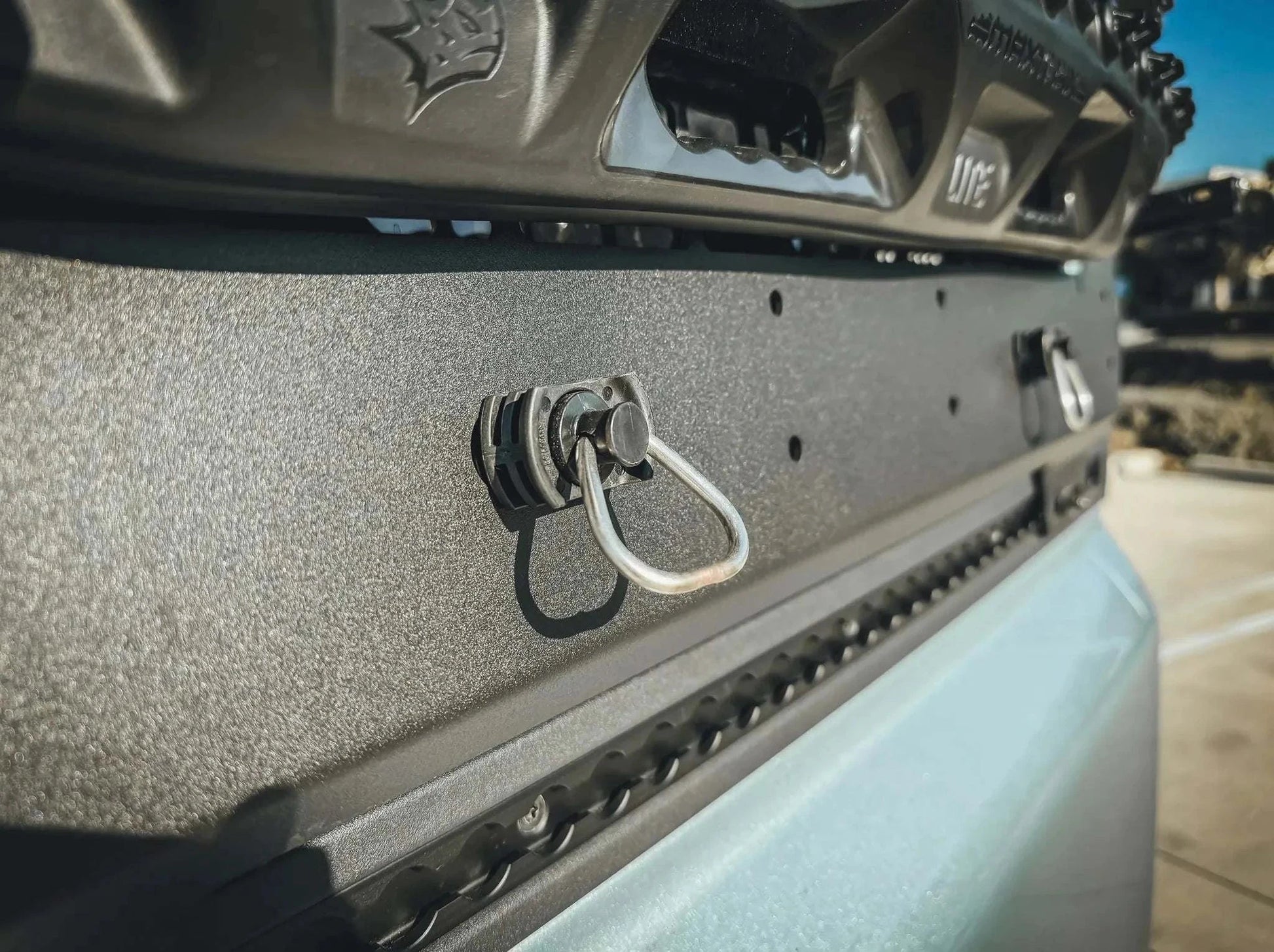 Grenadier Accessory Panel Side Kick by Leitner Designs mounted on vehicle with rugged finish and utility hook