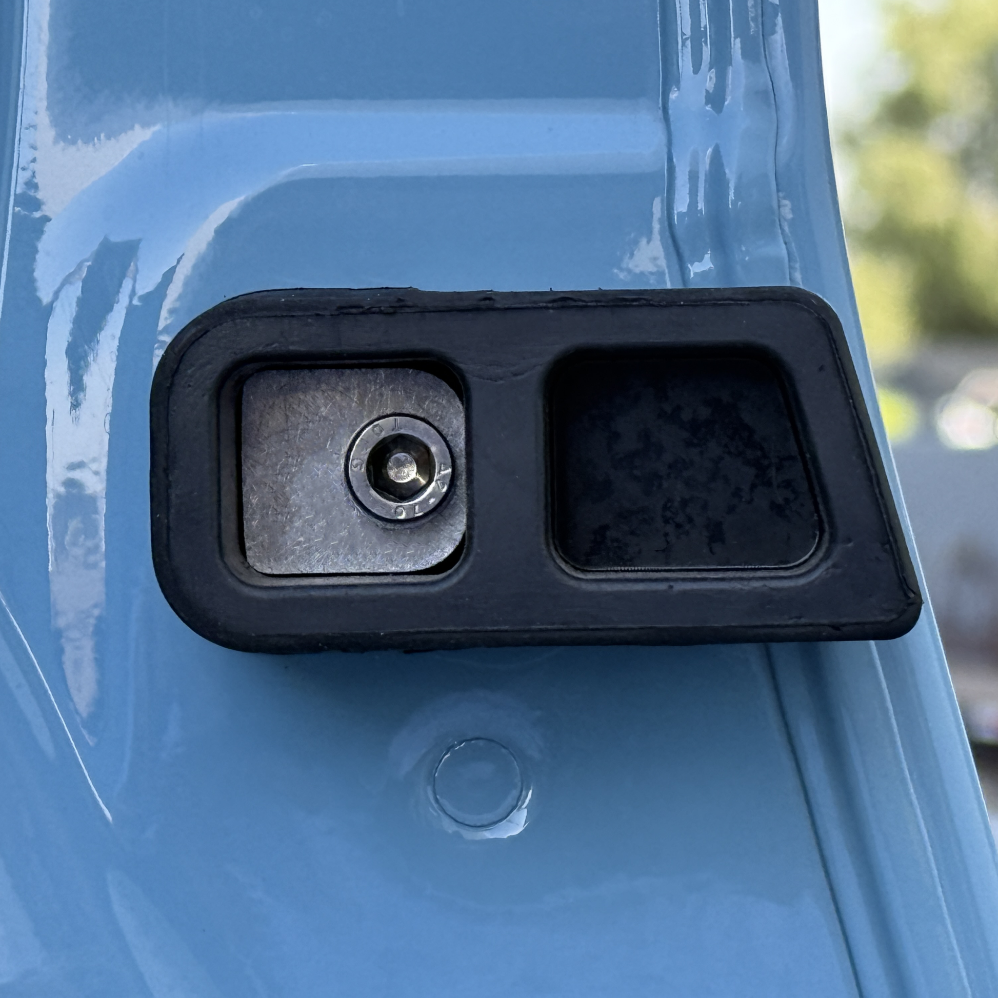 Rear Door Washers installed on INEOS Grenadier rear door rubber bumper to secure and protect paint.