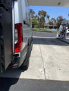 Super Single Spare Wheel mounted on off-road Sprinter van in matte black with aggressive design and Owl badge