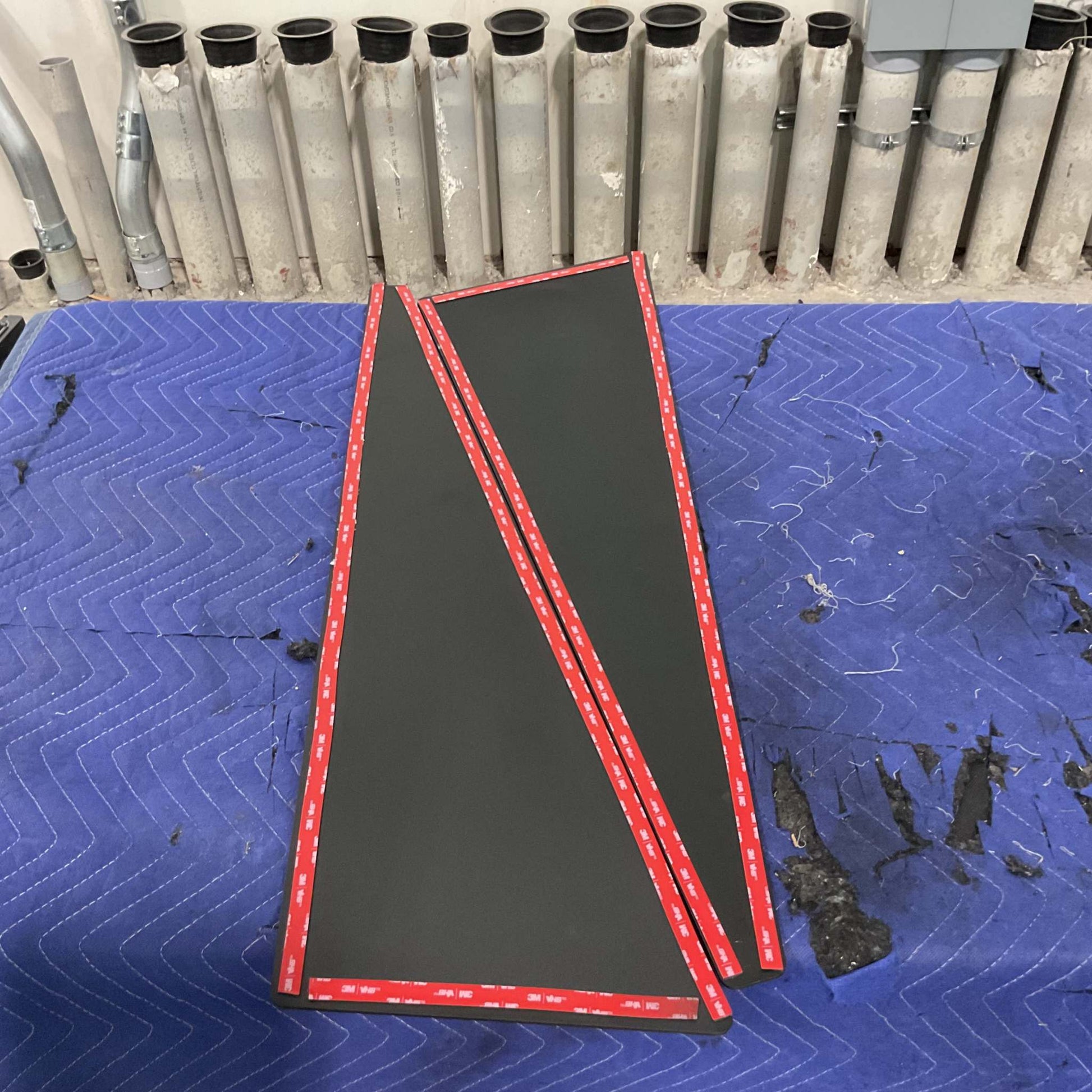 Grenadier Fender Armor Plates with adhesive backing on blue protective mat