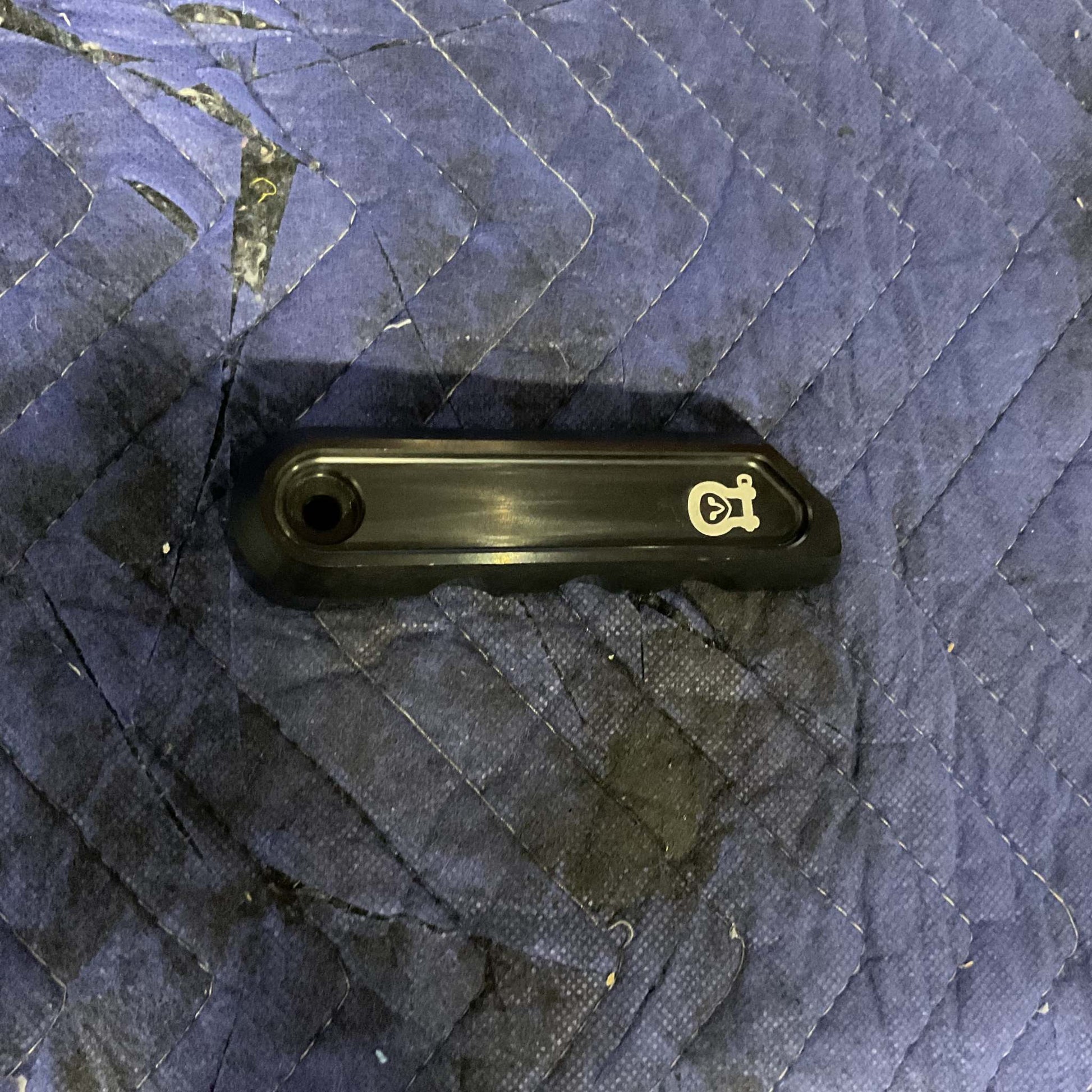 Grenadier aluminum rear door handle in black with Owl logo designed for INEOS Grenadier vehicles