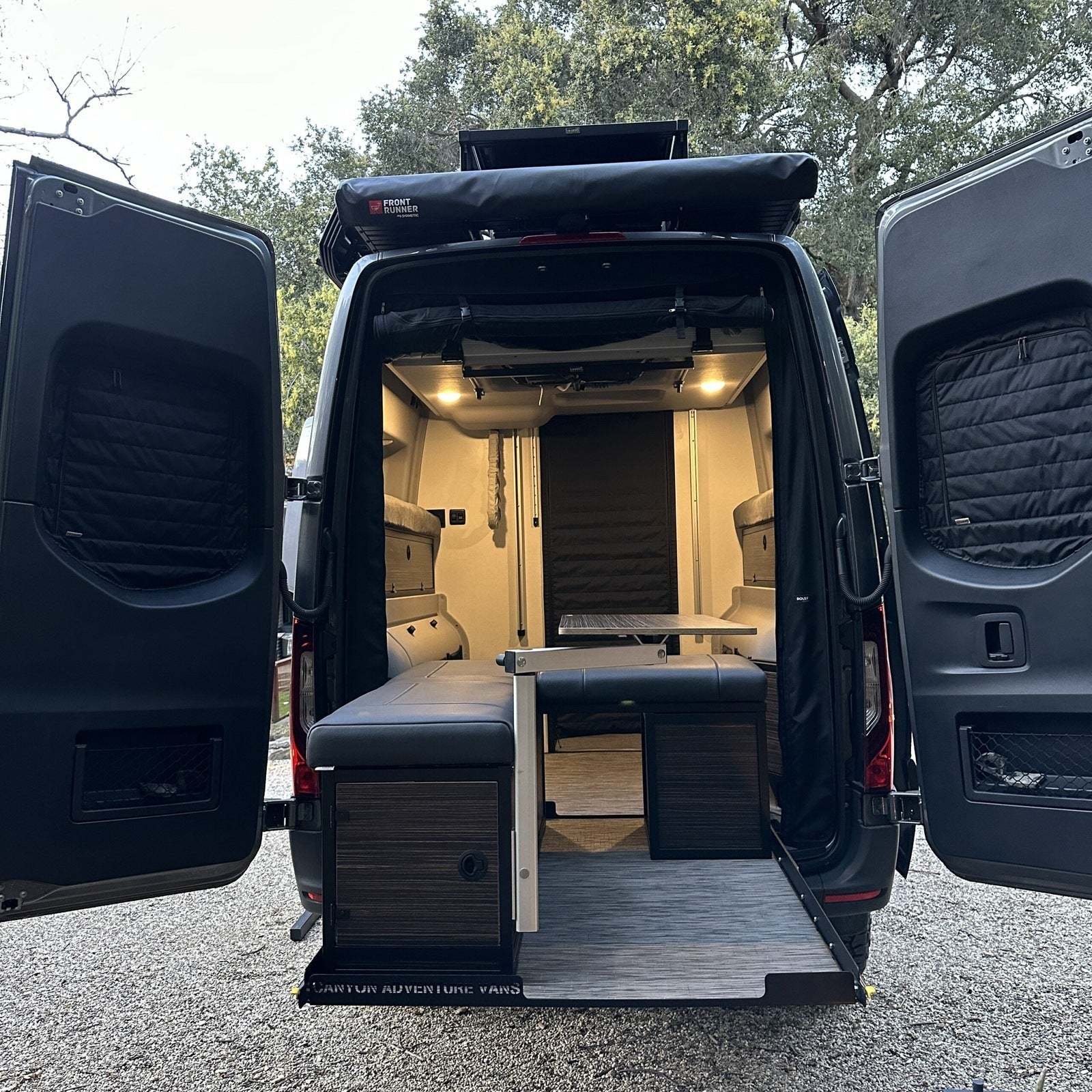 Sprinter van rear doors with CLIMA-SHADE insulated rear window covers installed for temperature control and privacy