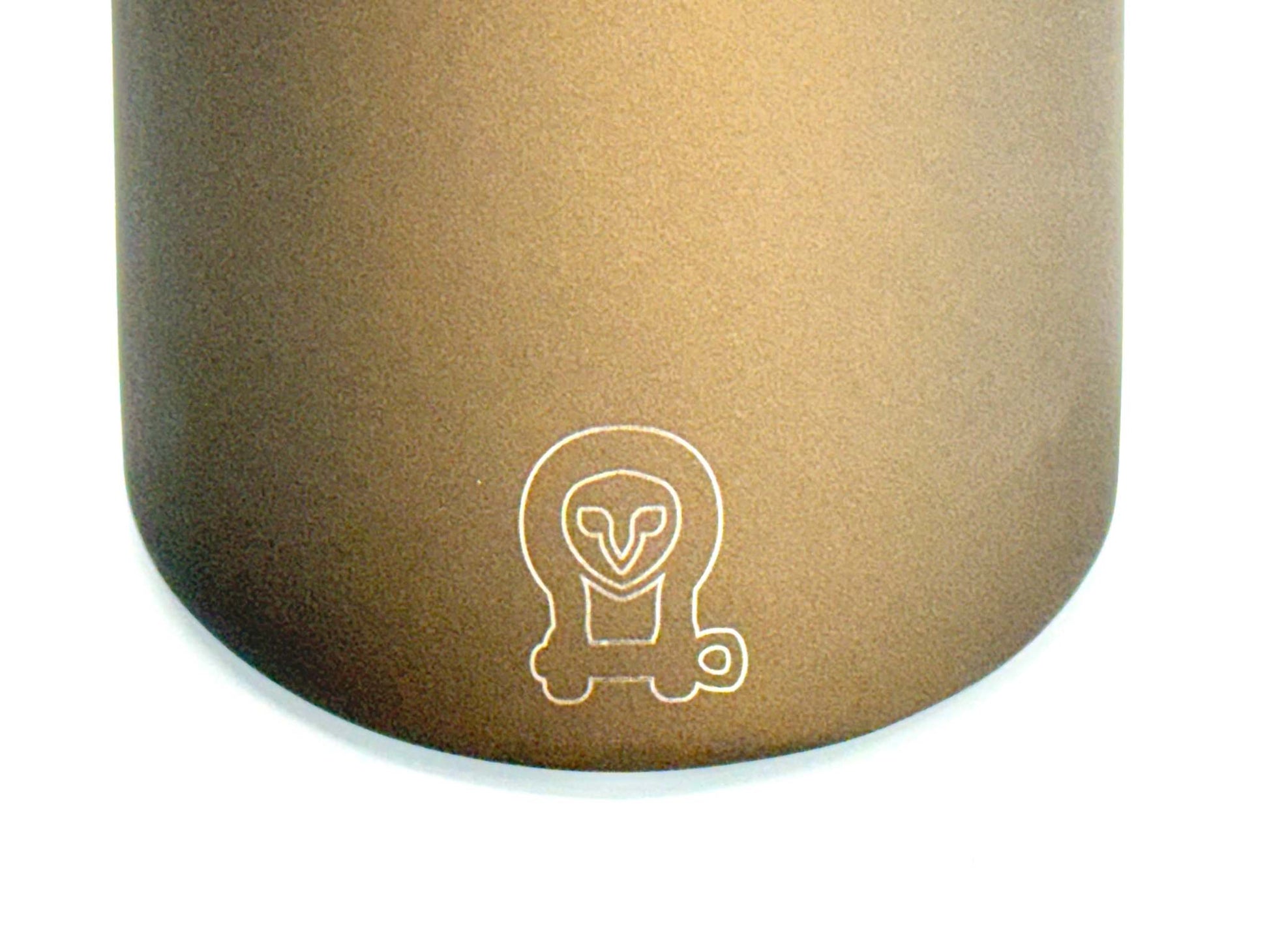 Burnt bronze double-walled stainless steel tip of Ekko Exhaust Upgrade with Owl logo