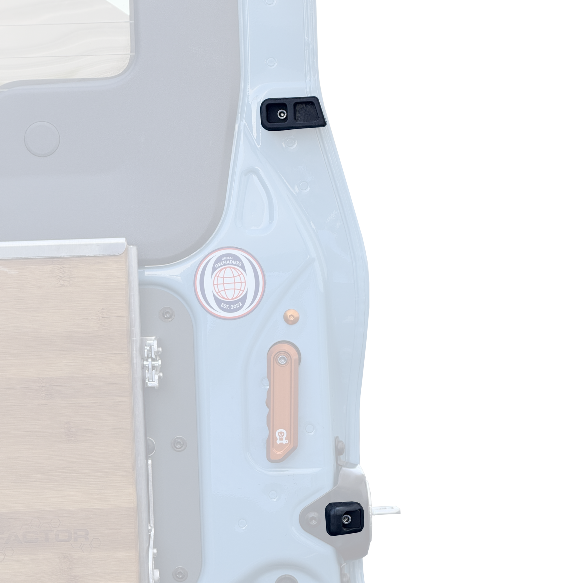 Rear door washers installed on the INEOS Grenadier rear door to secure rubber bumpers and protect paint.