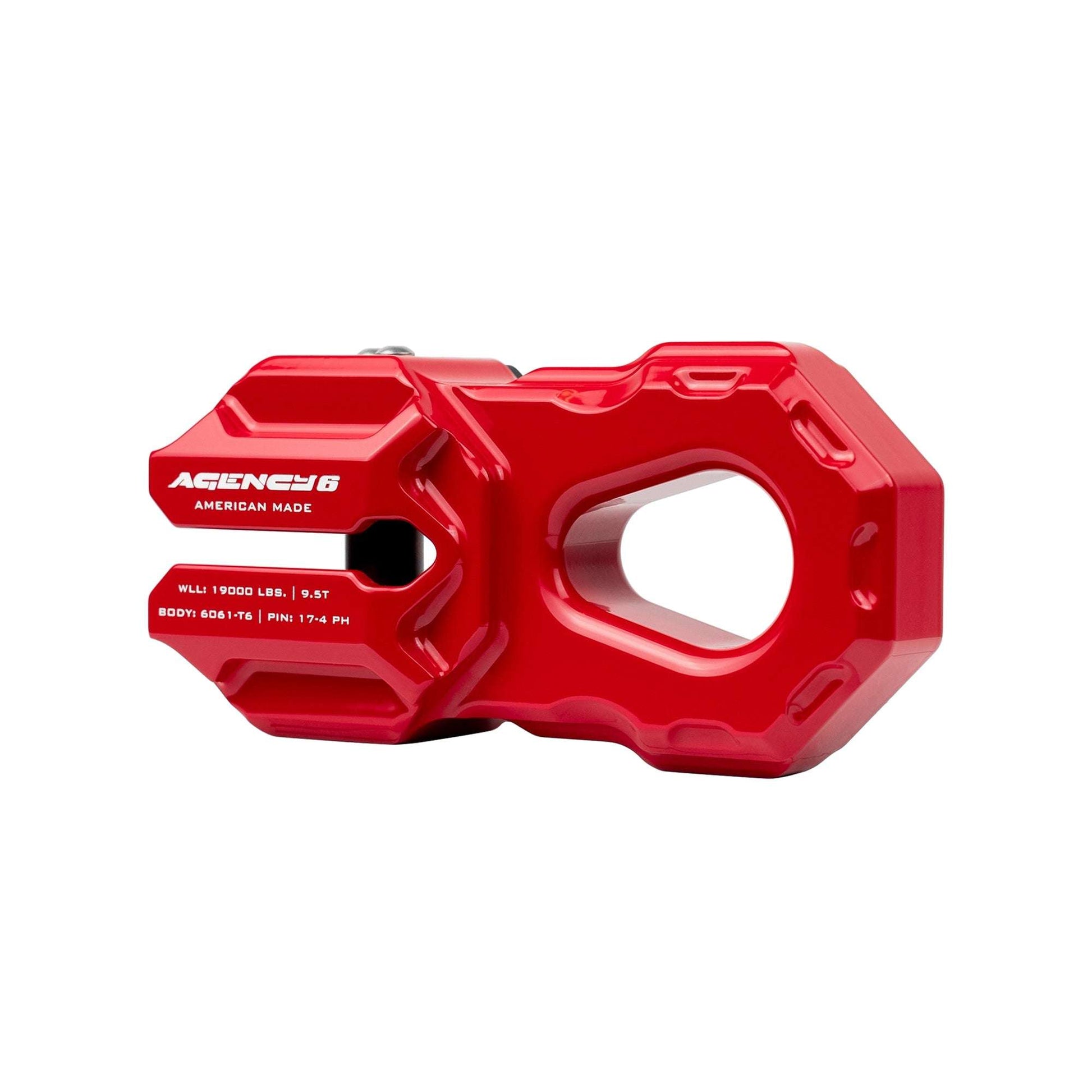 Red billet winch shackle made from solid aluminum with precision machining and a bold industrial design