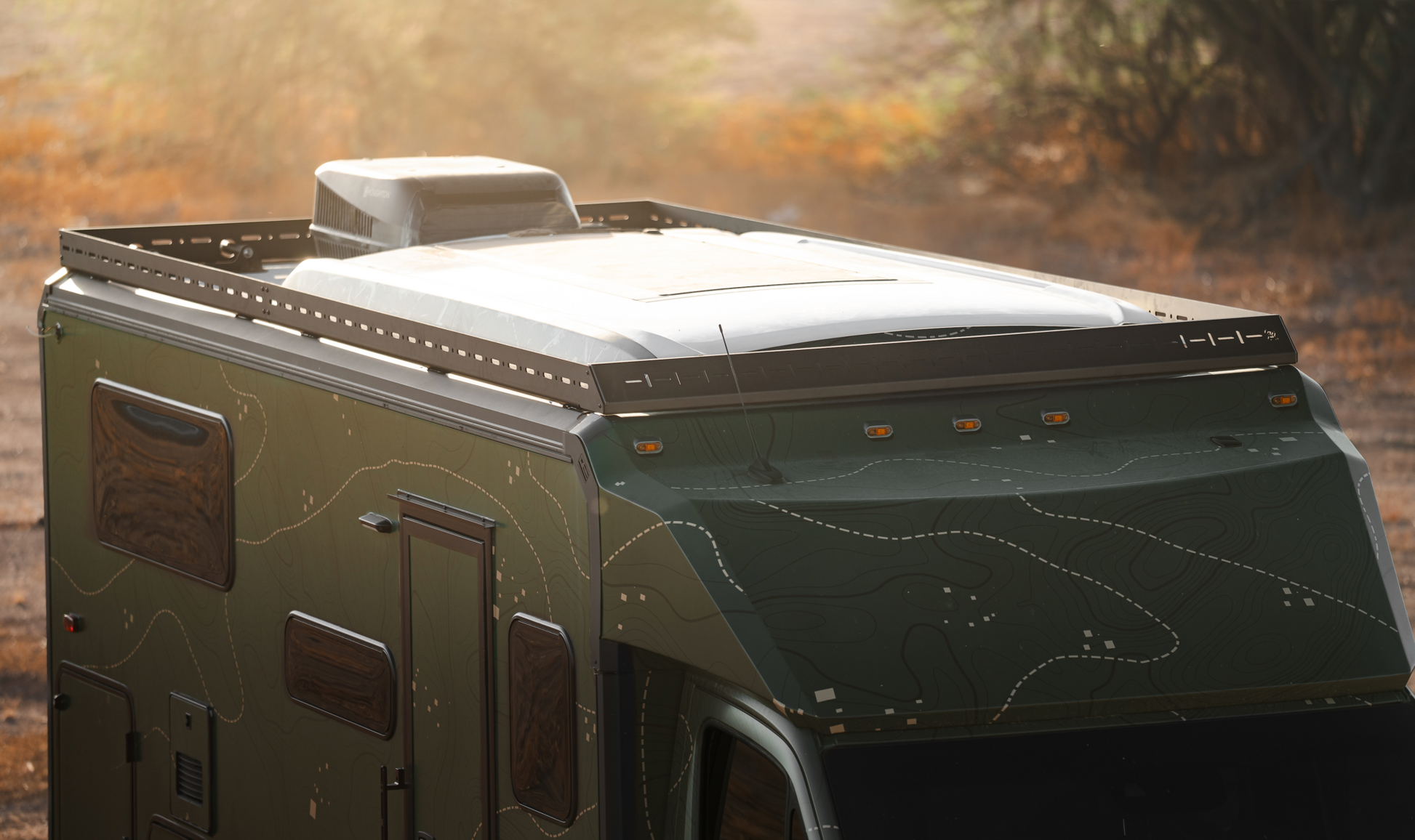Black powder-coated Ekko Roof Rack Teton Edition mounted on Winnebago Ekko RV roof with lightweight aluminum design and offroad lighting capability