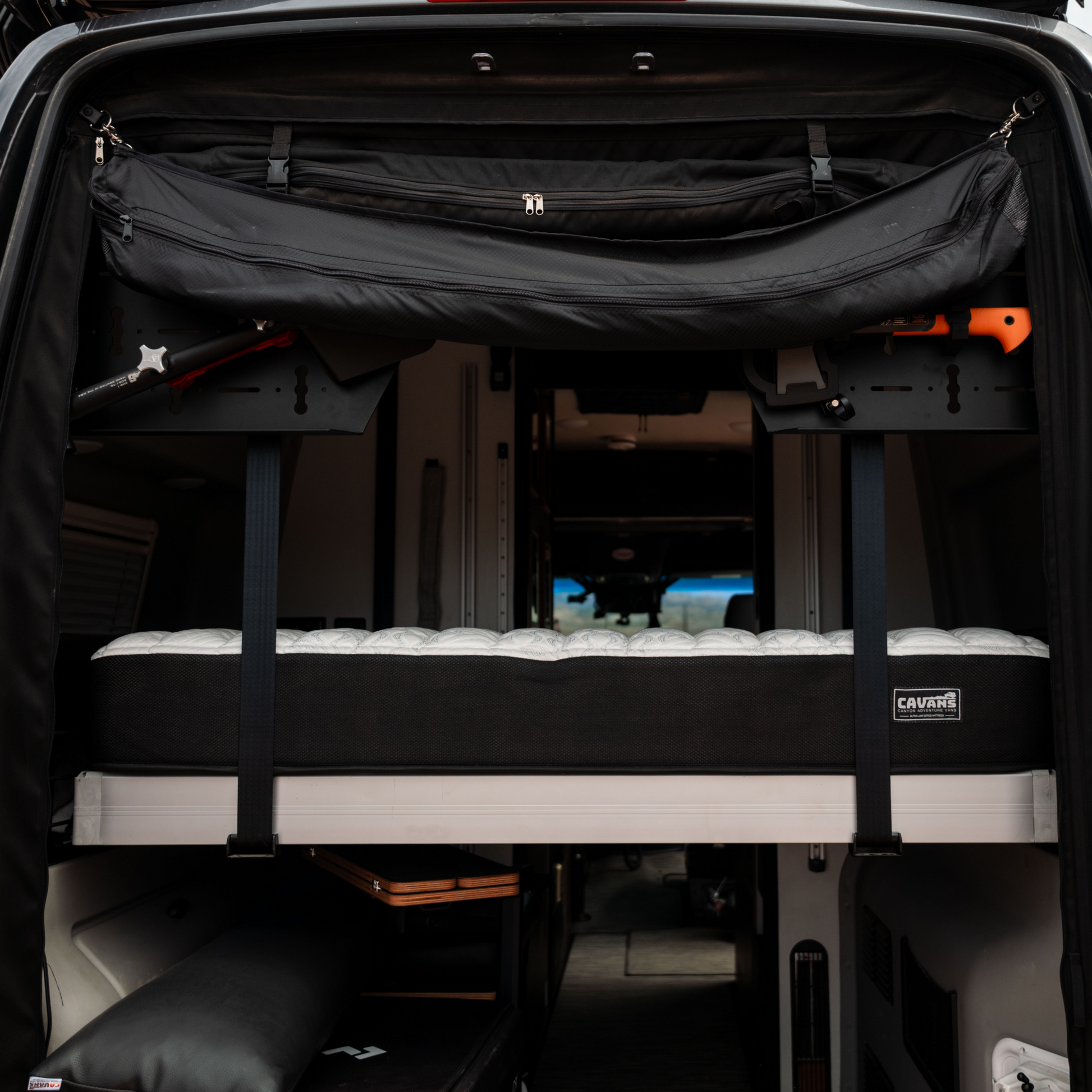 ULTRA Luxe Mattress installed in a van, showcasing a thick, comfortable home-quality mattress designed for REVEL '19 - '24, TERRAIN, LAUNCH models