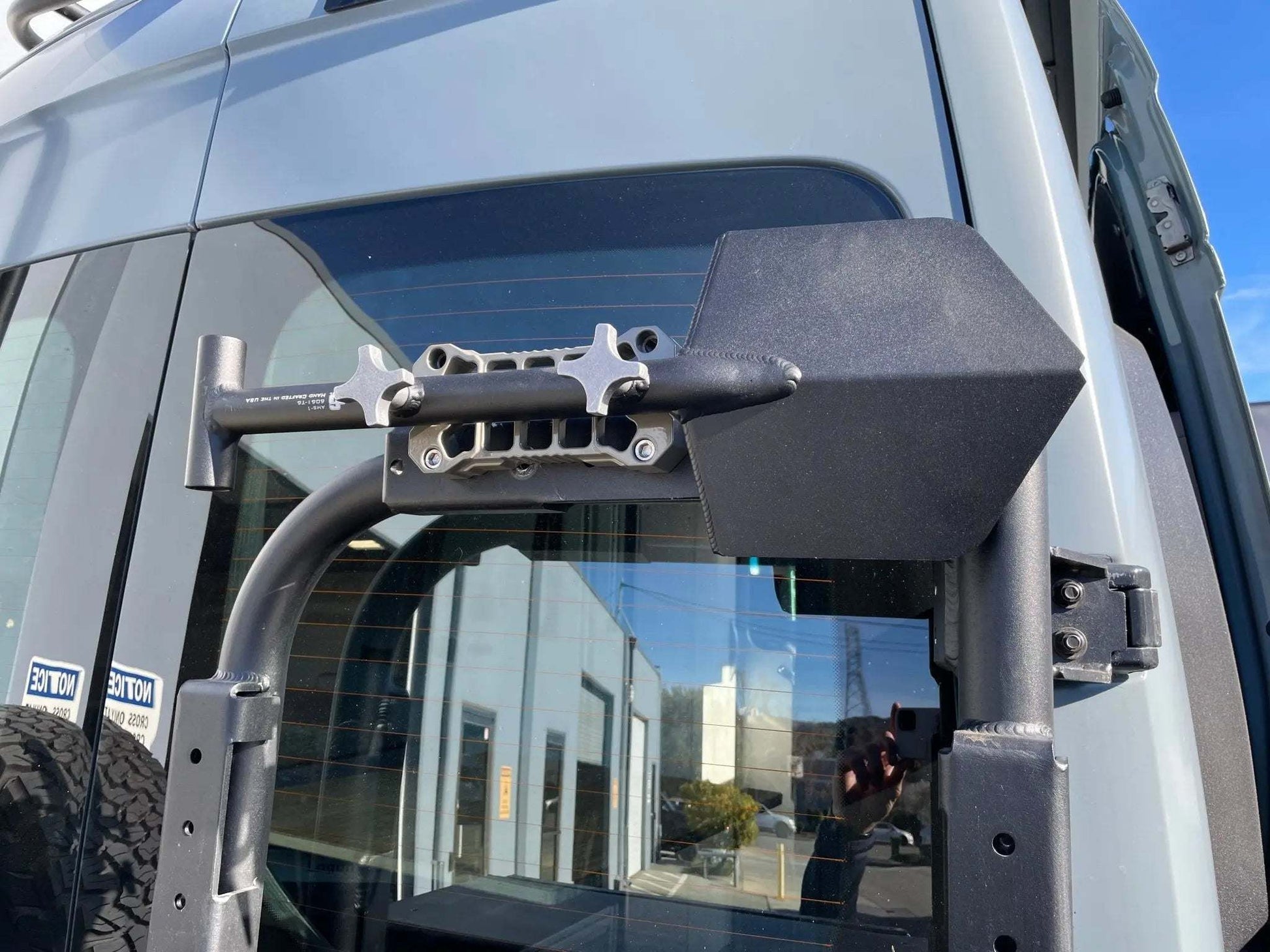 Recovery Shovel with mount attached to vehicle exterior.