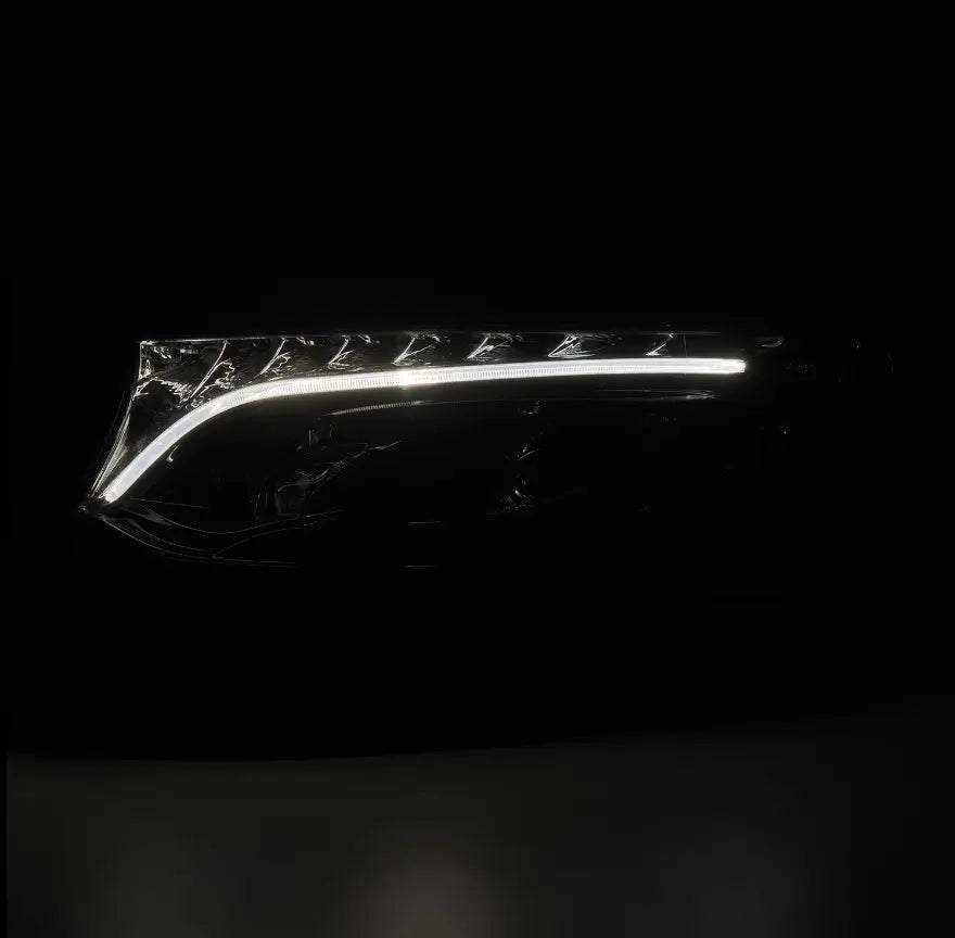 LUXX-Series LED Projector Headlights for Sprinter with LED daytime running lights and sequential turn signals.