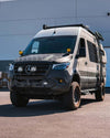 NOVA-Series LED Projector Headlights on a Sprinter van with sleek blacked-out housing and modern design.