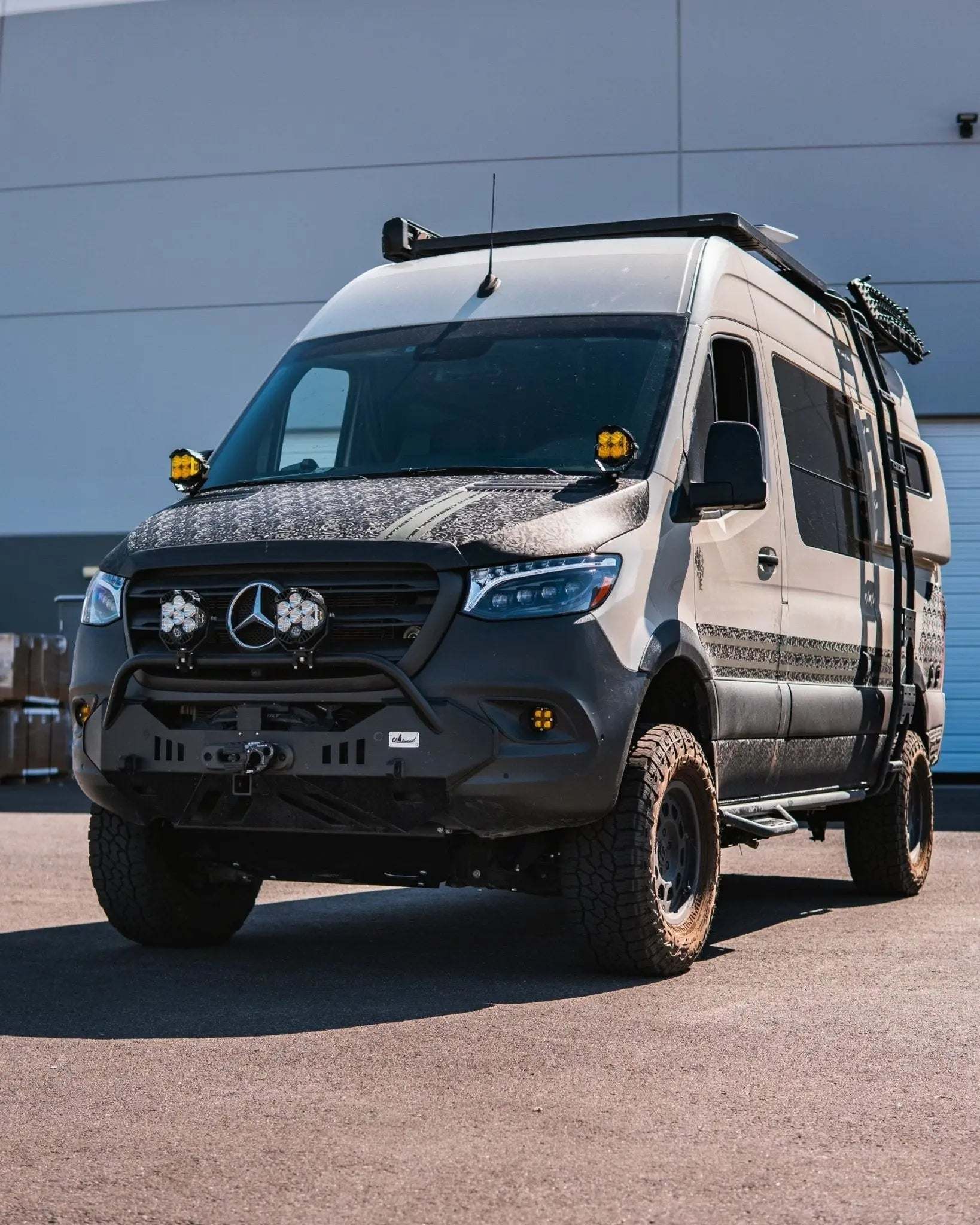 NOVA-Series LED Projector Headlights on a Sprinter van with sleek blacked-out housing and modern design.