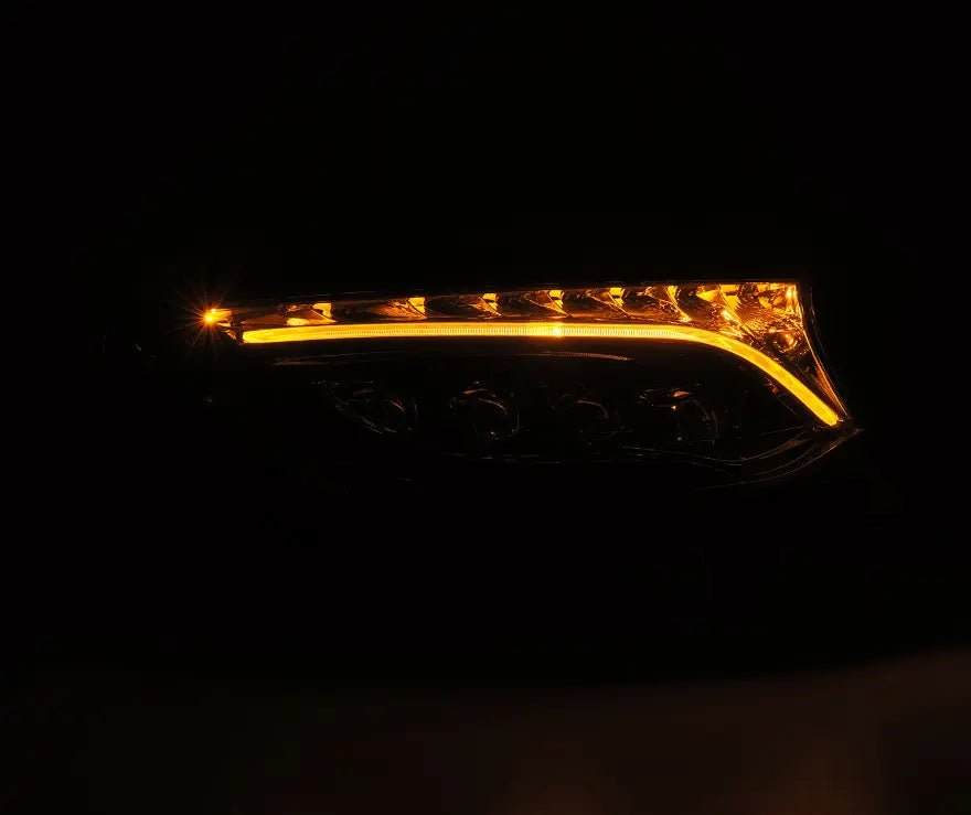 NOVA-Series LED Projector Headlights with sequential turn signals and blacked-out housing for Sprinter vehicles.