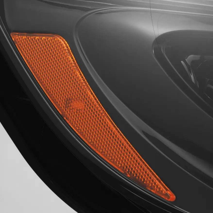 NOVA-Series LED Projector Headlight close-up, black housing, amber indicator lens.
