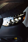 NOVA-Series LED Projector Headlights for Sprinter with sleek blacked-out housing and modern design.