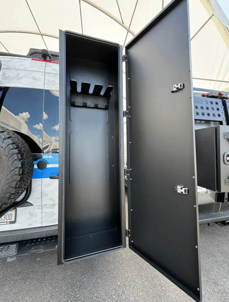 Black open van storage box with interior ski and snowboard racks mounted on vehicle side