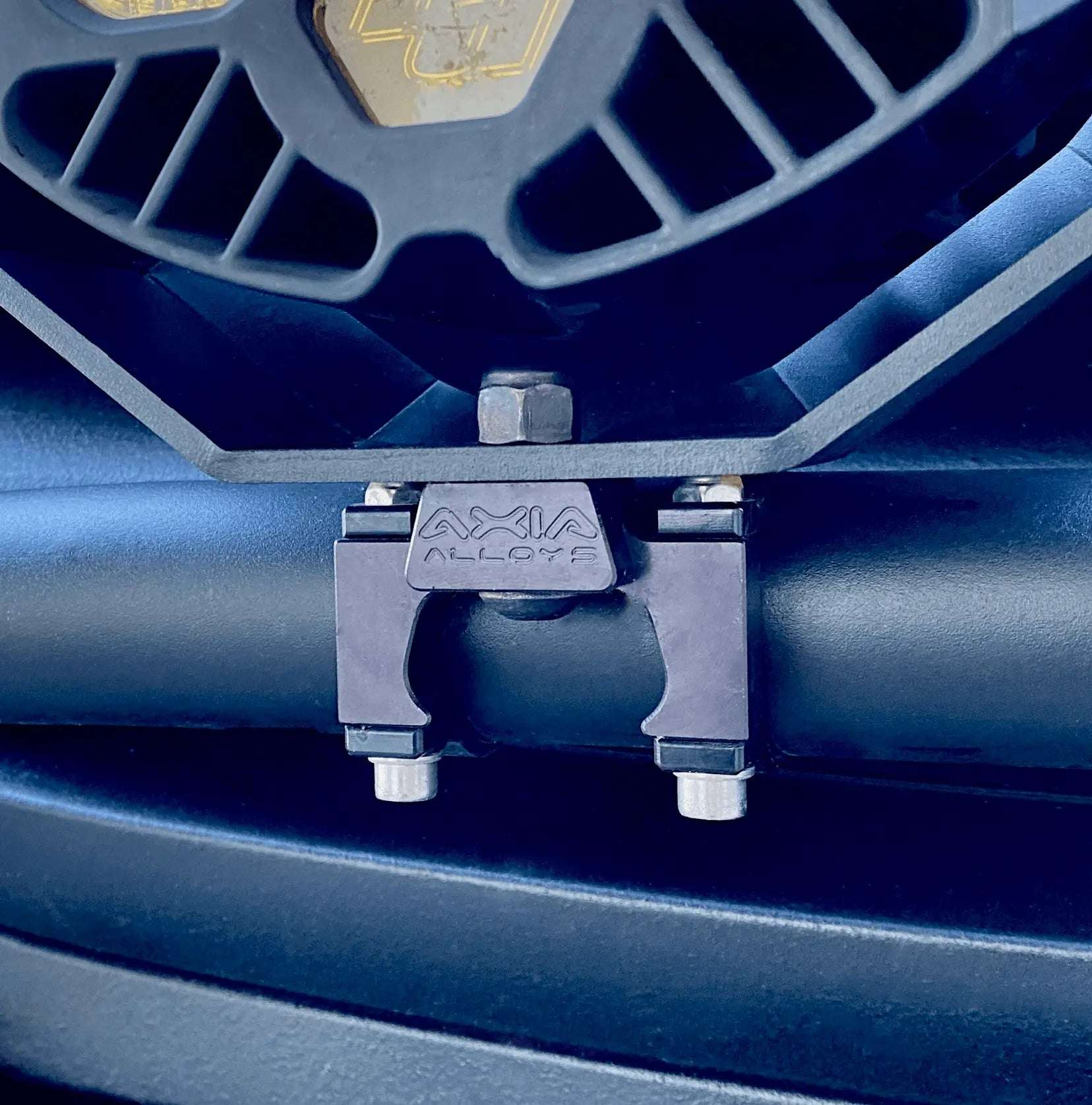 Light Mount for auxiliary lighting on bars and racks, made from machined aluminum.