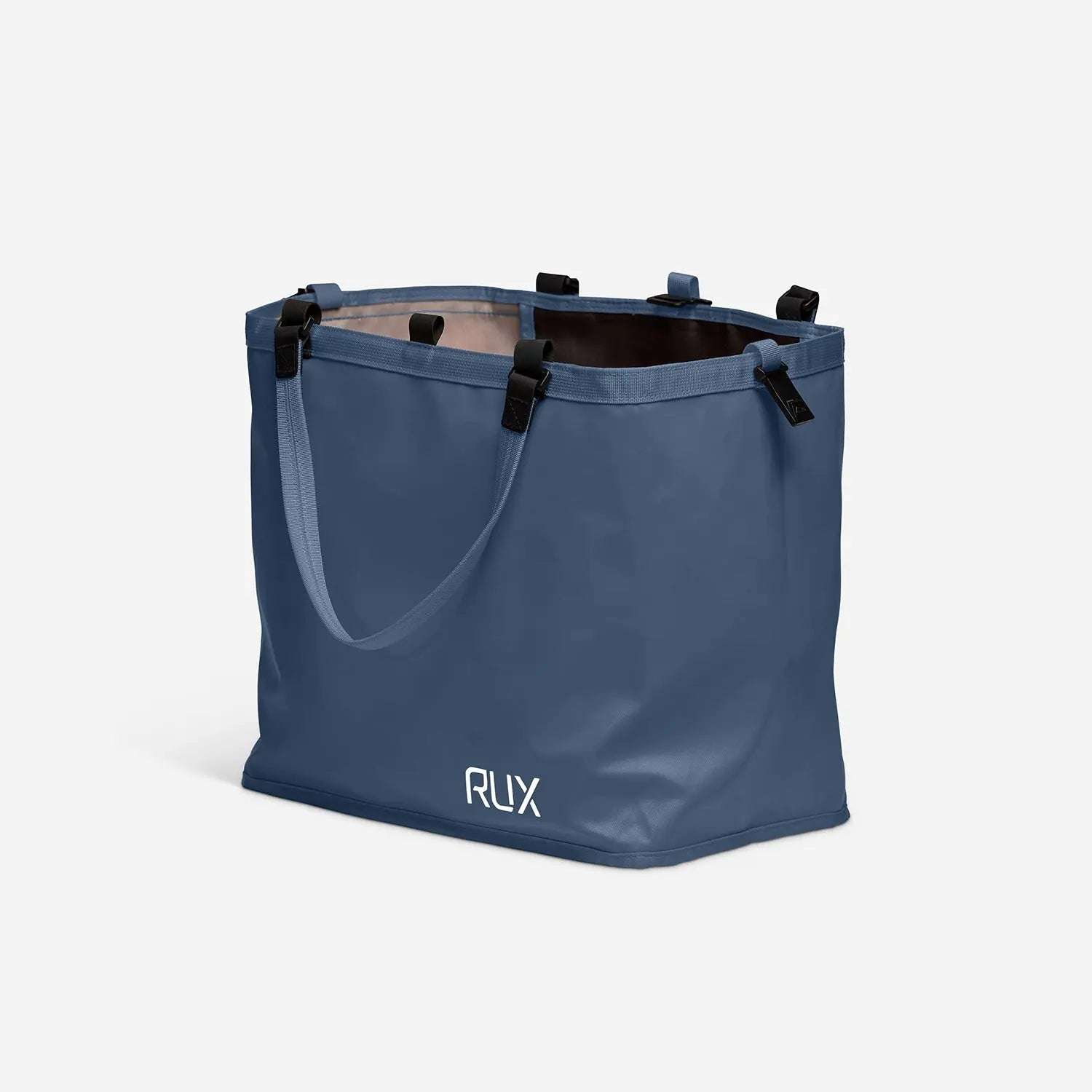 Blue RUX 25L Bag with handles for easy packing and nesting inside RUX 70L bag