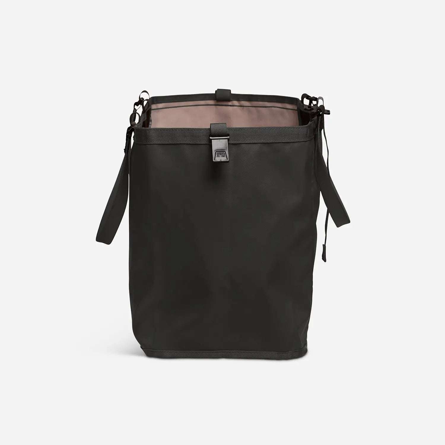 Black RUX 25L Bag with top buckle and side straps for versatile packing and nesting inside larger bags