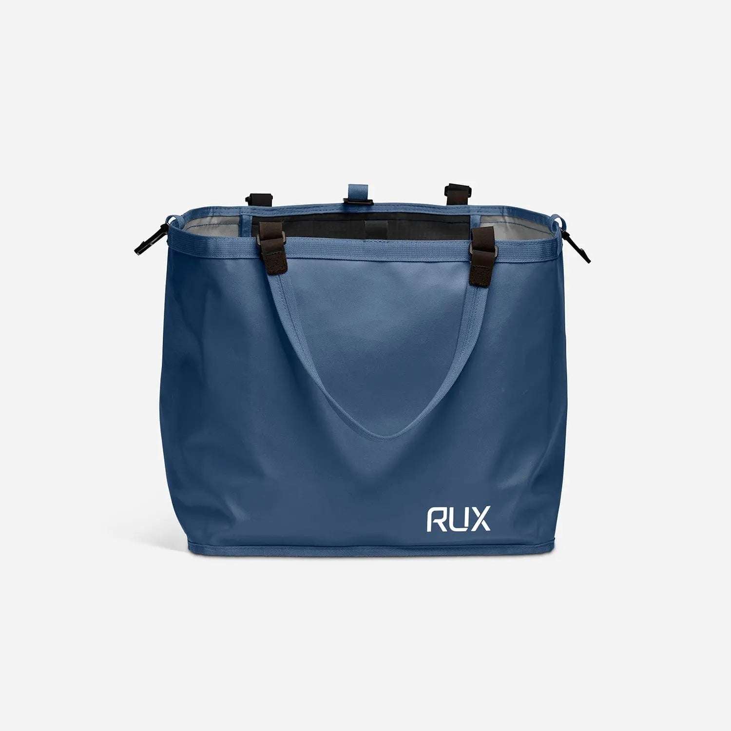 Blue RUX 25L Bag with handles, designed for versatile packing and nesting inside RUX 70L bag
