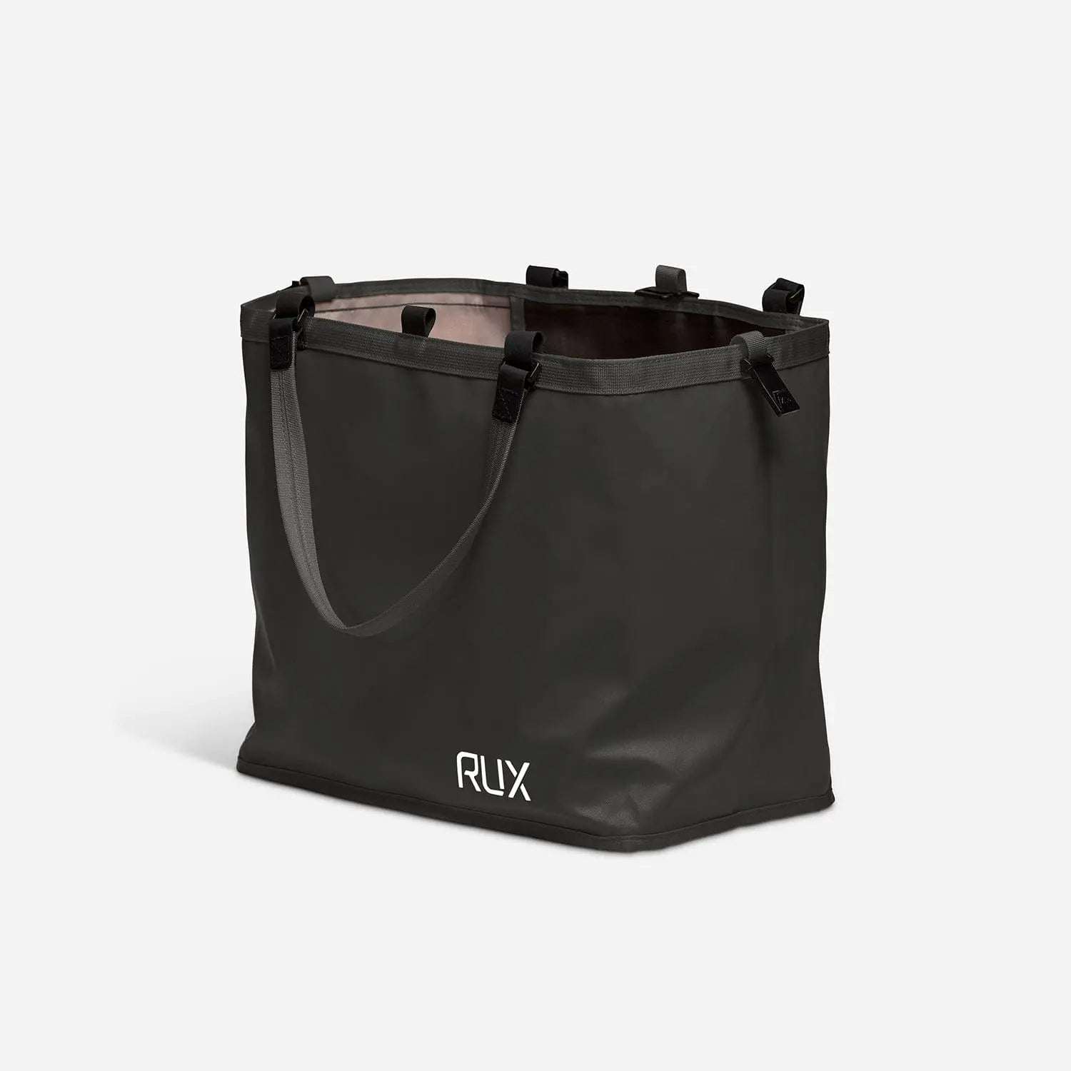 Black RUX 25L Bag with handles, versatile and easy to pack, nests inside RUX 70L Bag for organized storage