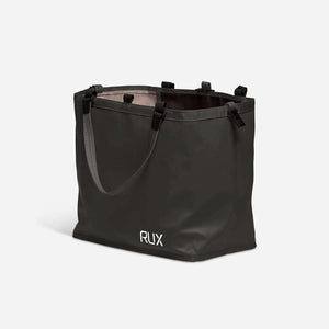 Black RUX 25L Bag with handles, versatile and easy to pack, nests inside RUX 70L Bag for organized storage