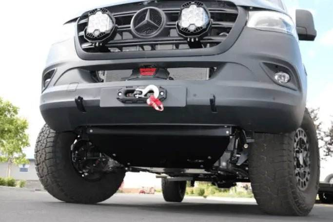 LP9 Sport LED Light mounted on front grille of off-road vehicle with Mercedes emblem and heavy-duty tires