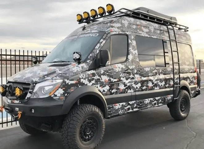 Off-road van equipped with LP9 Sport LED Light bars and digital camo wrap