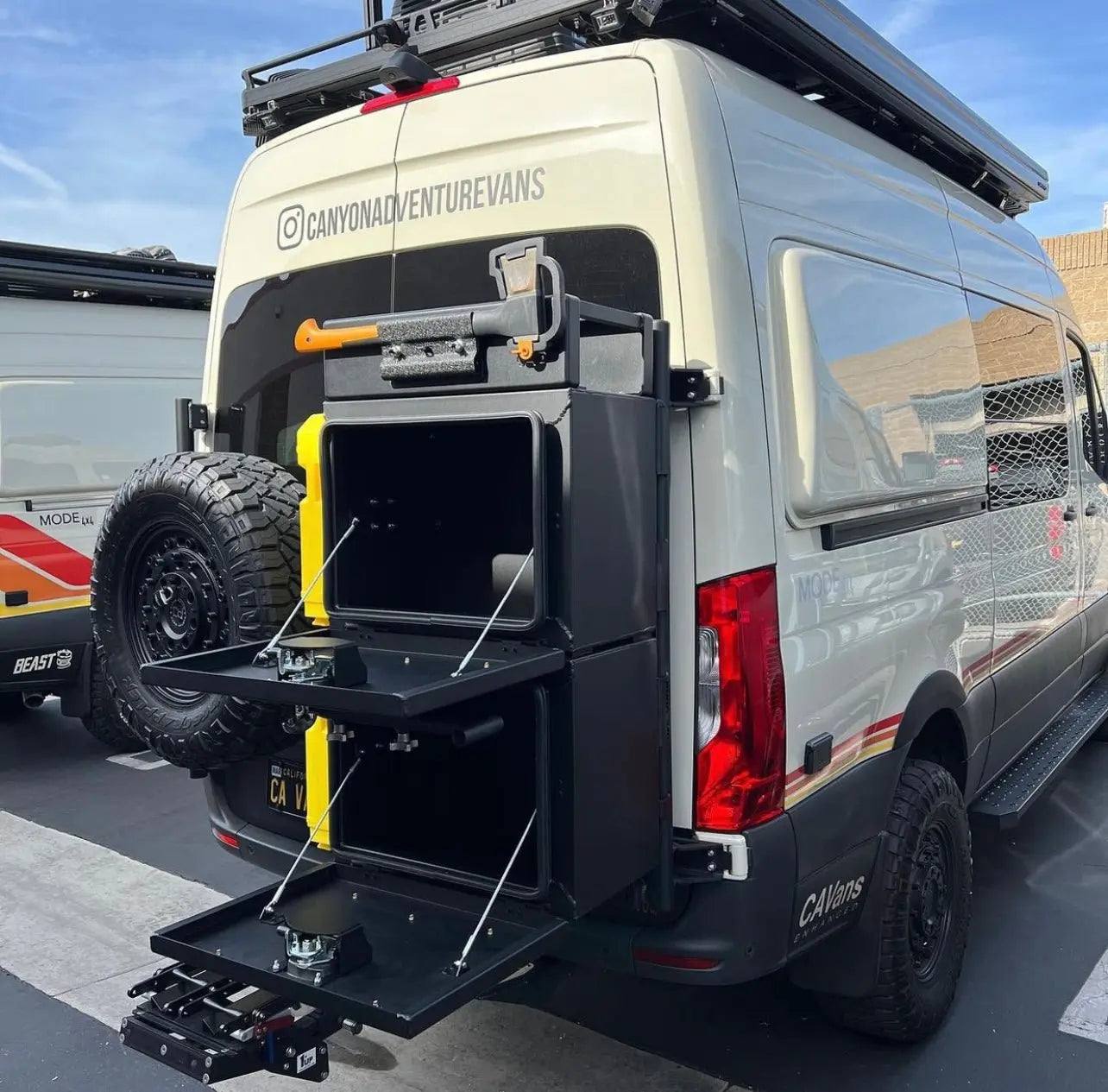 Medium Expedition Cargo Box mounted on van rear door with open storage compartments and rugged all-aluminum construction