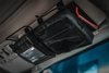 Modular Visor Panel for gear storage and organization in vehicles.