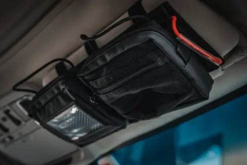 Modular Visor Panel for gear storage and organization in vehicles.