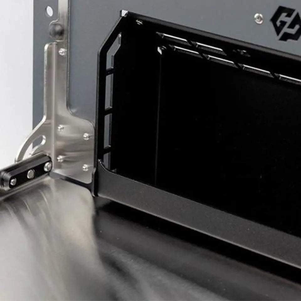 Folding Tailgate Table with storage cubby for INEOS Grenadier, showcasing durable design.