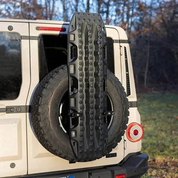 Maxtrax Spare Tire Mounting Kit on INEOS Grenadier for adventure and durability.
