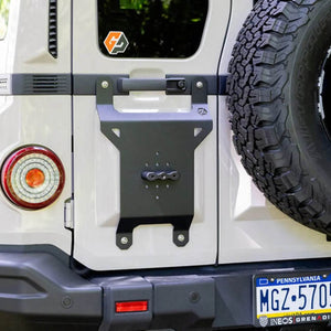 Rear Door Accessory Mount for INEOS Grenadier installed on vehicle rear.