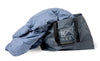 Blue down comforter partially inside a gray HEST branded carrying bag designed for adventure and durability