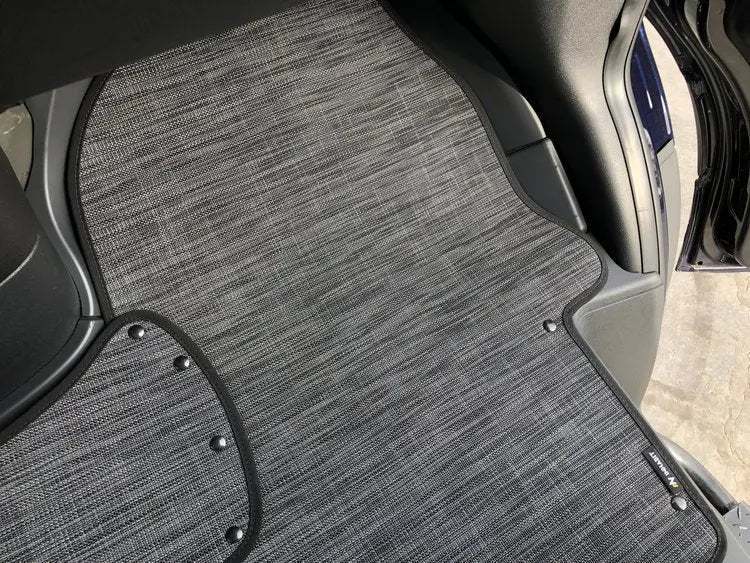 Floor mats for 2021-2024 Revel, designed for comfort and protection, fitting the vehicle interior.