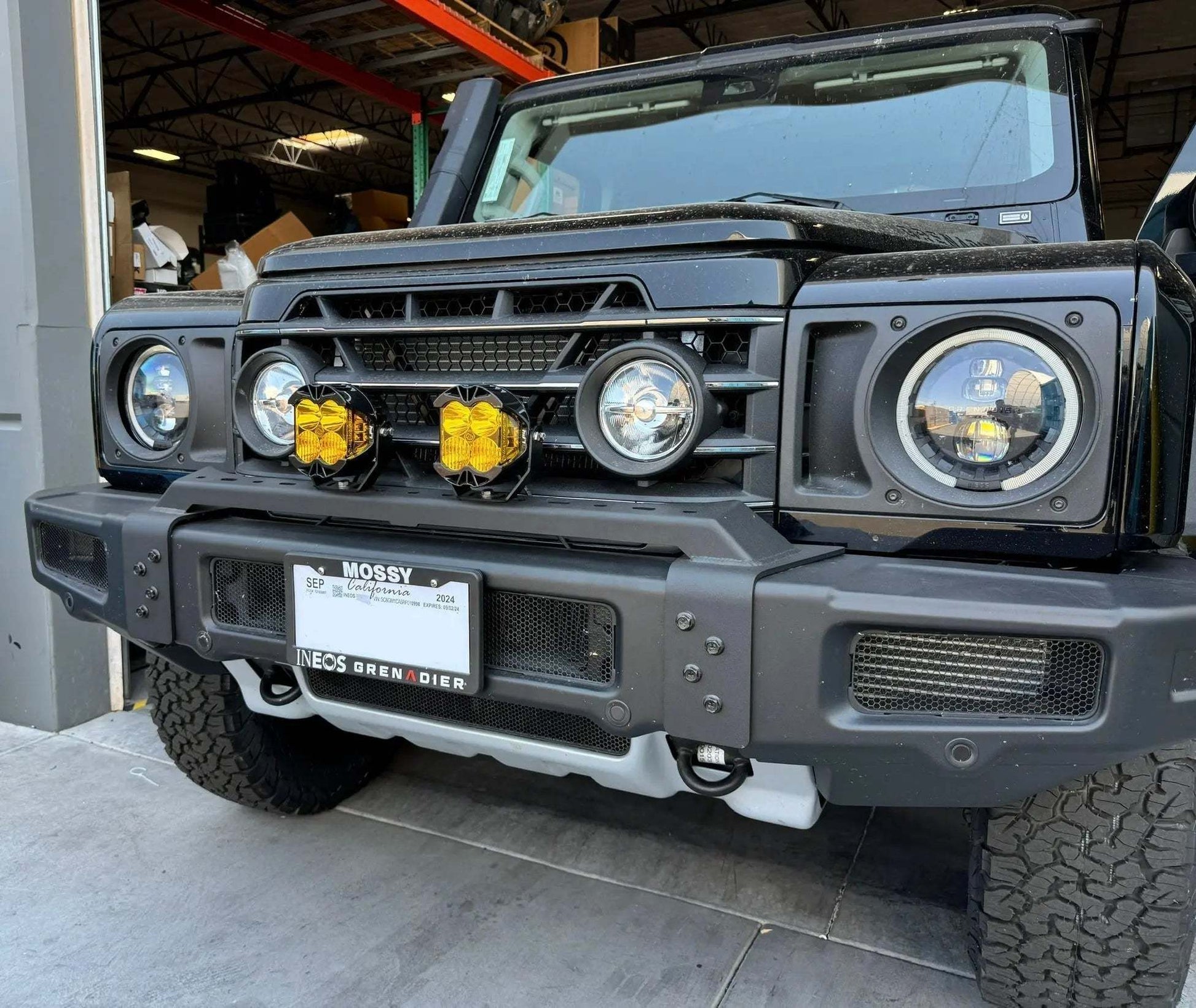 Front bumper light bar on INEOS Grenadier for off-road adventure.
