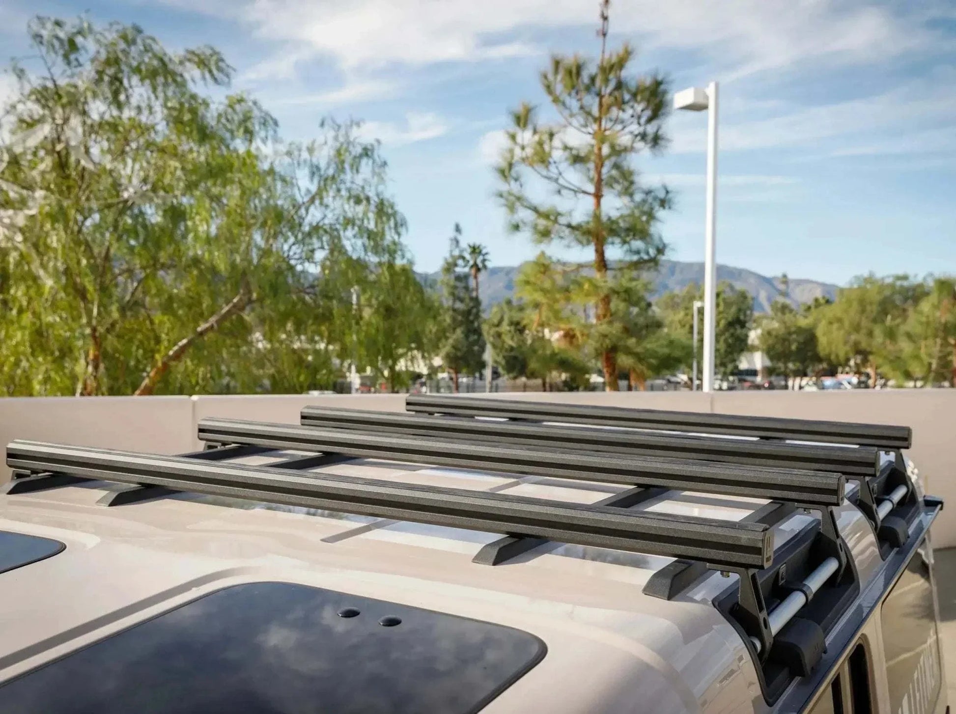Load Bar Kits for INEOS Grenadier on vehicle roof.