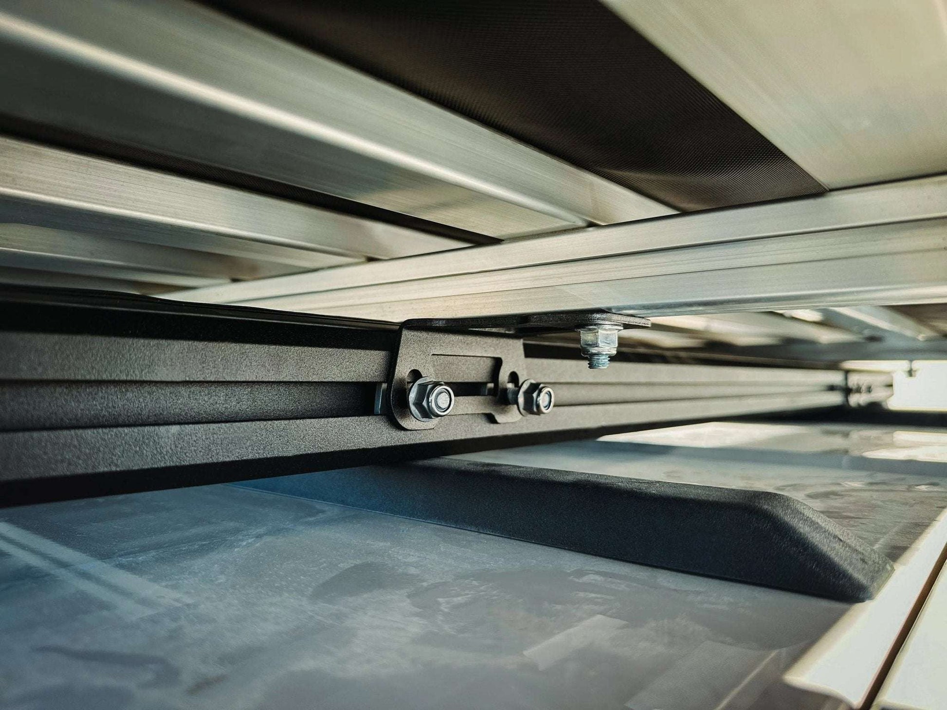 Roof top tent brackets for INEOS Grenadier, durable and high-performance design for adventure.