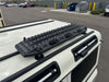 MKII Maxtrax Traction Boards mounted on vehicle roof, ideal for off-road recovery.