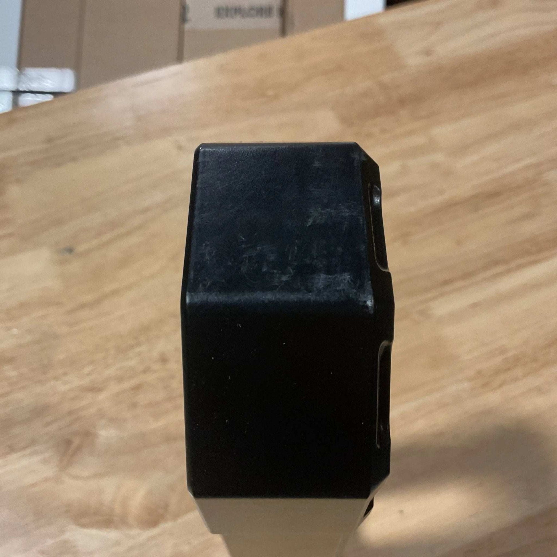 Black winch fairlead with minor scuffs, 1.5" thick, satin black powdercoat finish.