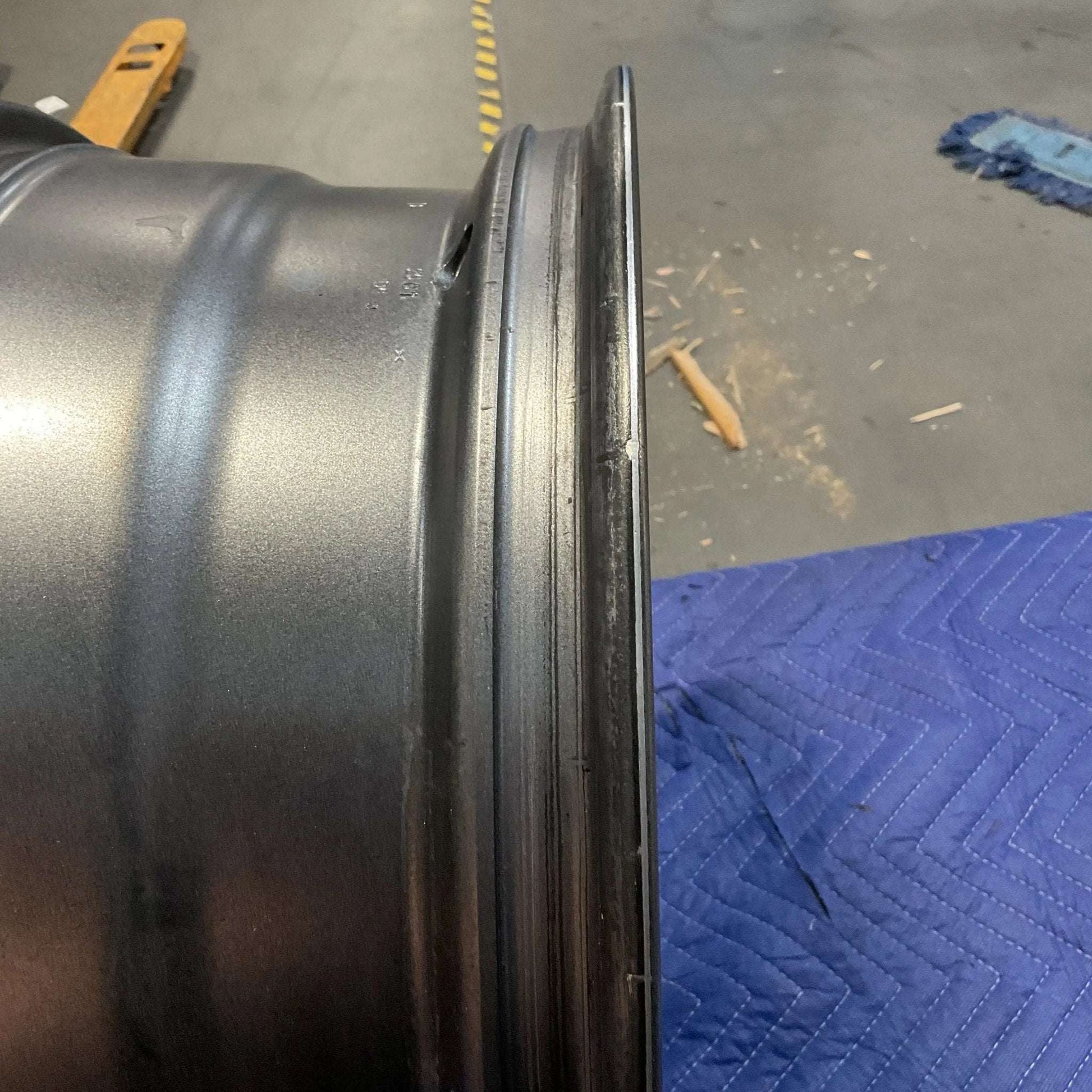 Graphite grey Owl Talon Sprinter wheel with minor scuffs, used condition.