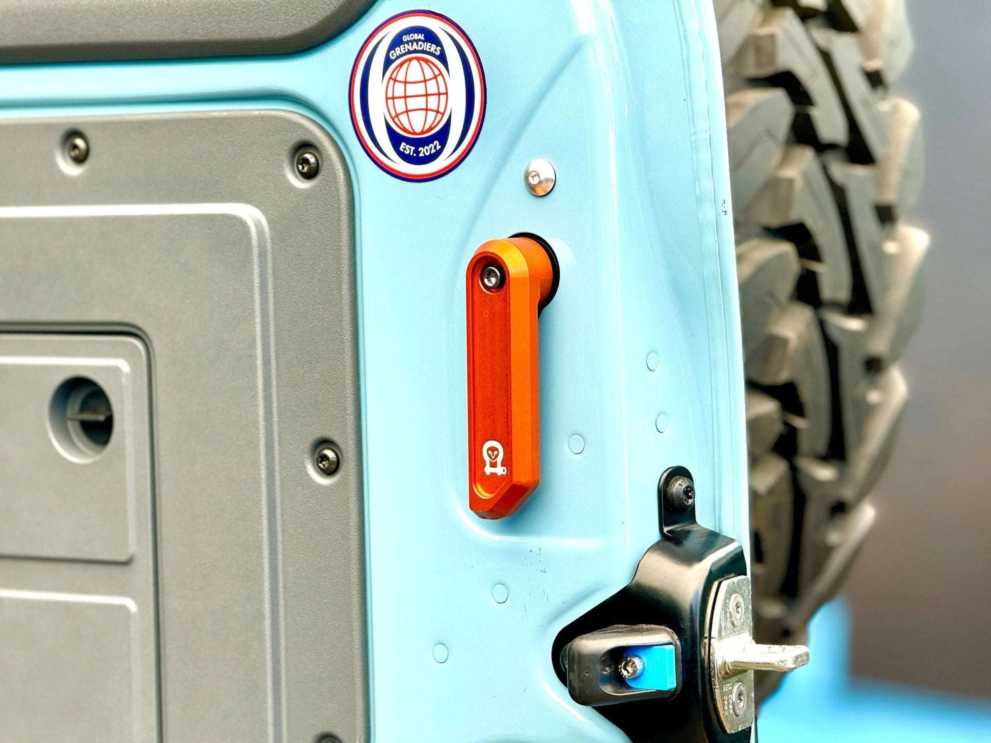 Aluminum Bolts Upgrade Kit installed on INEOS Grenadier rear door for enhanced durability and performance.