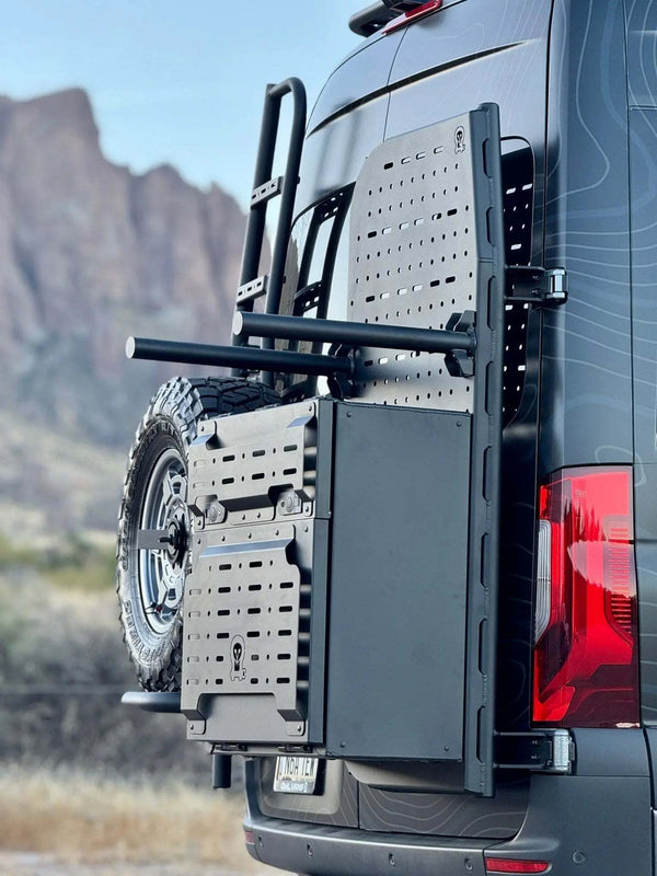 Heavy-duty Sprinter bike rack and box carrier mounted on rear door of van with modular storage options.