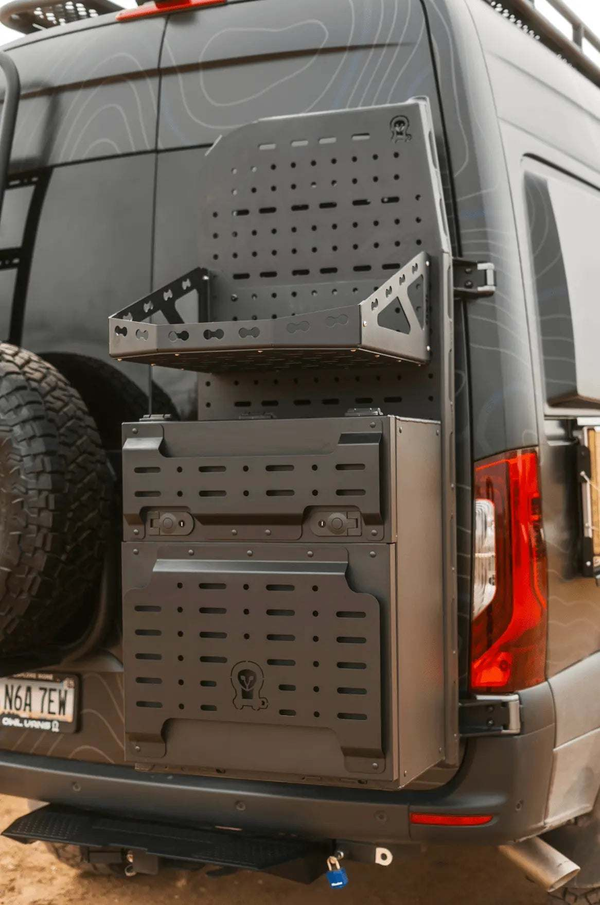 Sprinter bike rack and box carrier mounted on rear door of van with modular storage compartments