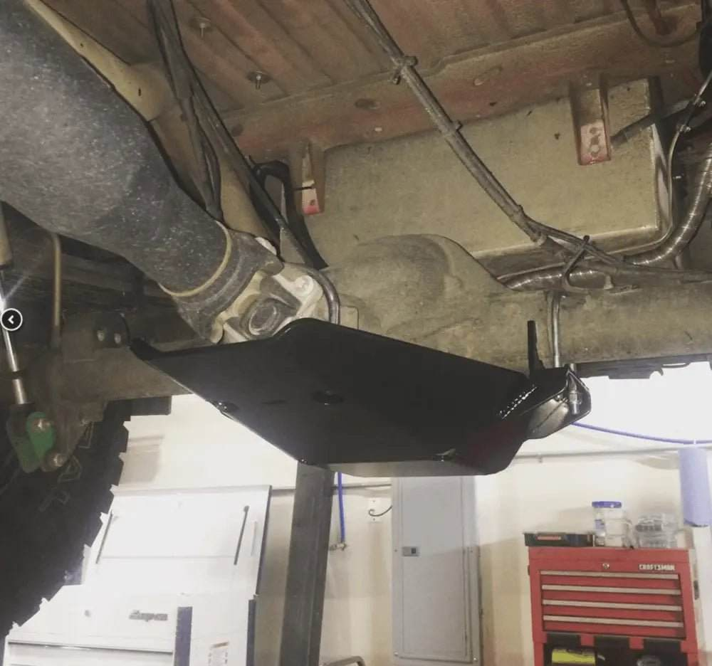 Sprinter 3500 skid plate installed protecting rear differential and driveshaft components under van