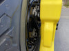 Expedition Handle 2.0 mounted on a tire carrier, showcasing CNC machined aluminum construction with black anodized finish for durability and grip.