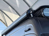 Fiamma roof rack with Sprinter awning mount and round bar mounts on van roof